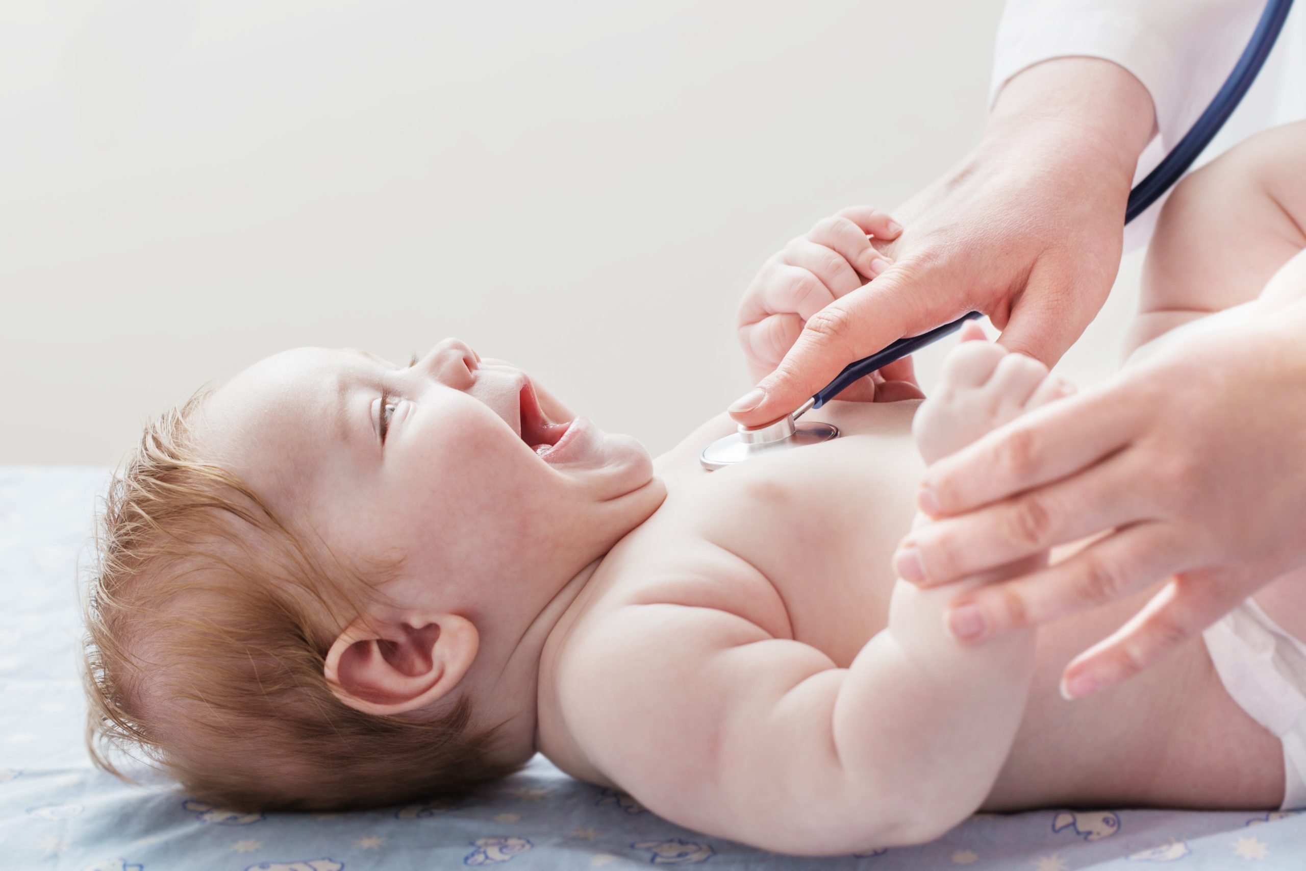 Baby is examined by doctor. Newborn and infant care Knoxville Tennessee.