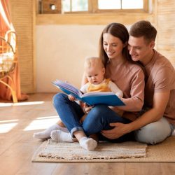 Early,Education,For,Kids.,Parents,Reading,Book,To,Their,Cute Early,Education,For,Kids.,Parents,Reading,Book,To,Their,Cute